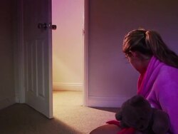 Man doorway, girl with teddy bear. Stock Footage