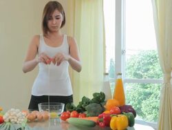 Hands breaking an egg Stock Footage