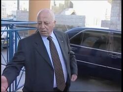 Daylight aftermath at bomb site, Qureia comments, checkpoint Instructional Video