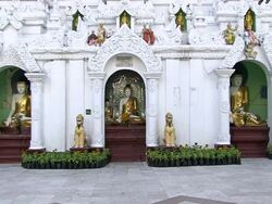 WS View of Golden and white Buddha statues outside white temple / Yangon, Yangon Division, Myanmar  Stock Footage