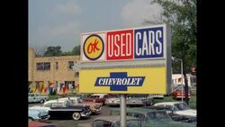 MS Sign of used cars parking lot / United States Stock Footage