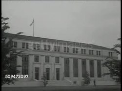 1936: U.S. HOSPITAL: CU Survey of 'Doctors, Dentists & Dollars.' MS Hospital. INT WS Nurse, patients in ward room. WS Nurse attending bed ridden patients. Franklin Roosevelt's New Deal program. Health, medical Instructional Video