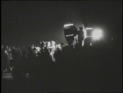 A crowd awaits the arrival of Charles Lindbergh in Paris, France. News Clip