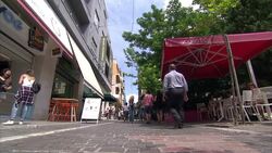 People Eating A Meal Outside In Athens News Clip