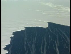 Aerial view over ice sheet, Antarctica Stock Footage