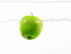 Splashing Apple .. Stock Footage