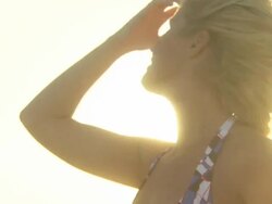 Blonde young woman in bikini, Cape Town, South Africa Stock Footage