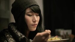 Close-up of Asian girl enjoying tasty and healthy food. Stock Footage