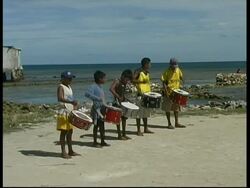 Cuna children playing drums, MS, Panama, Central America Stock Footage