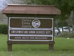 2009 MS Sign outdoors on grass for 'Employment and Human Services Dept.'/ Antioch, California, USA/ AUDIO Stock Footage