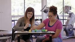 Speech therapist working with a teenage patient Stock Footage