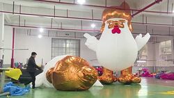 CLEAN : It's gonna be huge: China factory hatches giant Trump chickens News Clip