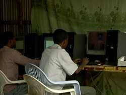 Men using computer Stock Footage