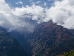 Time-lapse of a colorful village on a Himalayan mountainside. Cropped. Stock Footage