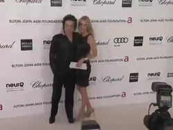 Paul Stanley and Erin Sutton at Elton John Aids Foundation Celebrates 20th Annual Academy Awards Viewing Party Stock Footage