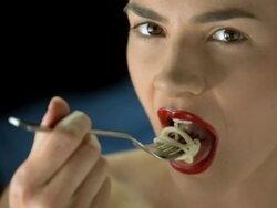 HD Super Slow-Mo: Beautiful Woman Eating Spaghetti Stock Footage