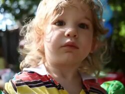 CU Shot of little boy in floaties at birthday party / Montezuma, Punteranes, Costa Rica Stock Footage