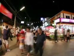 People walking in night market Stock Footage