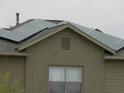 Solar panels on roofs, neighborhood traffic in Austin Texas Stock Footage