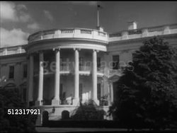 1952: THE WHITE HOUSE: WASHINGTON, D.C.:  VS The White House South entrance building & lawn, fountains. INT VS Empty Oval Office of the United States President in the West Wing, President's chair & desk (neat). DC, Presidency, election, executive Instructional Video