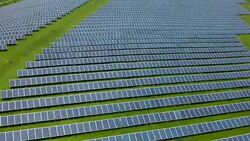 Solar Power Plant Aerial Flyover Stock Footage