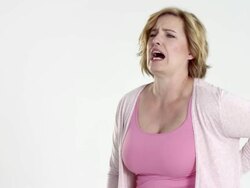 blonde plus size / best age model - backache/lumbago Stock Footage