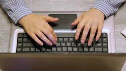 Businesswoman using laptop Stock Footage