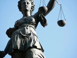 PAN TU Lady Justice holding balance scales  Stock Footage