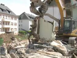 MS PAN Demolition of apartment block / Saarburg, Rhineland-Palatinate, Germany Stock Footage