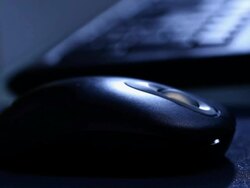 Woman using a computer mouse  Stock Footage