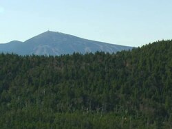 WS ARIEAL View of Ski mountain with forest /Maine, United States Stock Footage