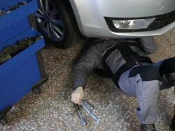 Mechanic working under the car Stock Footage