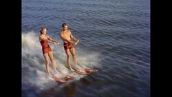 MS TS HA Young couple waterskiing on sea / United States Stock Footage