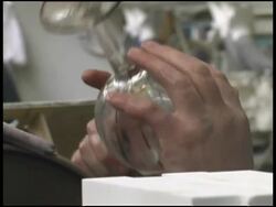 Glassworking: Etching Crystal Goblet on Rotating Blade Stock Footage