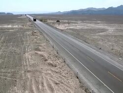 WS HA View of vehicles running on highway besides Nazca lines / South Of Peru, Nazca, Peru Stock Footage