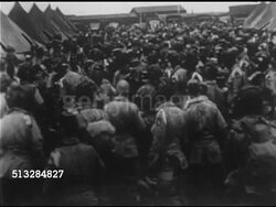 1944: INVASION OF NORMANDY: WS US Paratroopers at Greenham Common Airfield, England w/ General Dwight D. Eisenhower walking down through infantry, MS Talking w/ blackened face 101st Airborne paratrooper, SOFT MS 'Screaming Eagles' boarding aircraft. Instructional Video