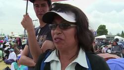 VOICED : Emocion de los fieles tras misa papal News Clip