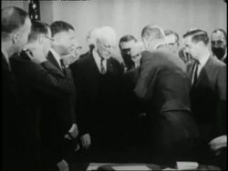 U.S. President Lyndon Johnson signs the National Voting Rights Act in 1965. News Clip