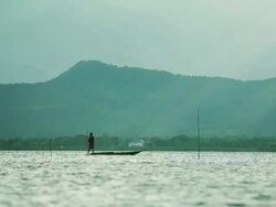 Fishing On Kwan Phayao the Lake with sunbeam Stock Footage