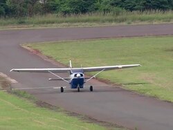 MS AERIAL TS Shot of Light aircraft taking off / iSimangaliso Wetland Park, Kwazulu Natal, South Africa Stock Footage