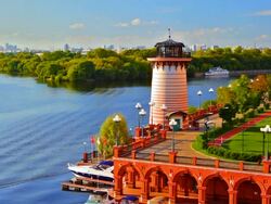Light house on the river near luxury place Stock Footage