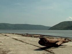VIEW OF RIVER FROM RIVERBANK Stock Footage