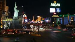 Neon signs flash and illuminate Las Vegas Boulevard. Stock Footage