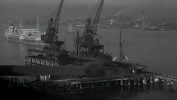 1946 MONTAGE Dam construction with train passing before hydroelectric power plant / United Kingdom? Stock Footage