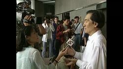 Artist Liu Yuyi displays a painting celebrating the Hong Kong Handover News Clip