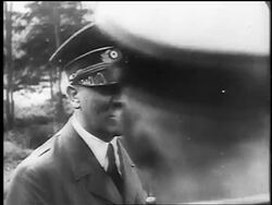 B/W June, 1940 close up happy Adolf Hitler talking to officers outdoors / documentary Stock Footage