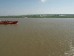 AERIAL WS One ship flowing in mississippi river / New Orleans, Louisiana, United States Stock Footage