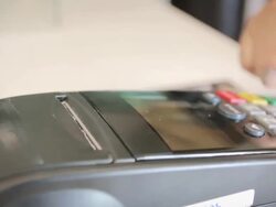 Women Swiping A Credit Card,Dolly Shot Stock Footage