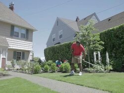 WS Man and woman rking in back yard  / Portland, Oregon, United States  Stock Footage