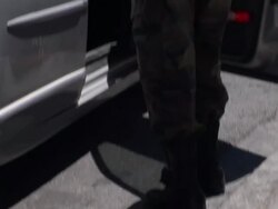 April 9 2009 MONTAGE Mexican Soldiers searching car,  Mexican and US border, Juarez, Chihuahua, Mexico, AUDIO Stock Footage